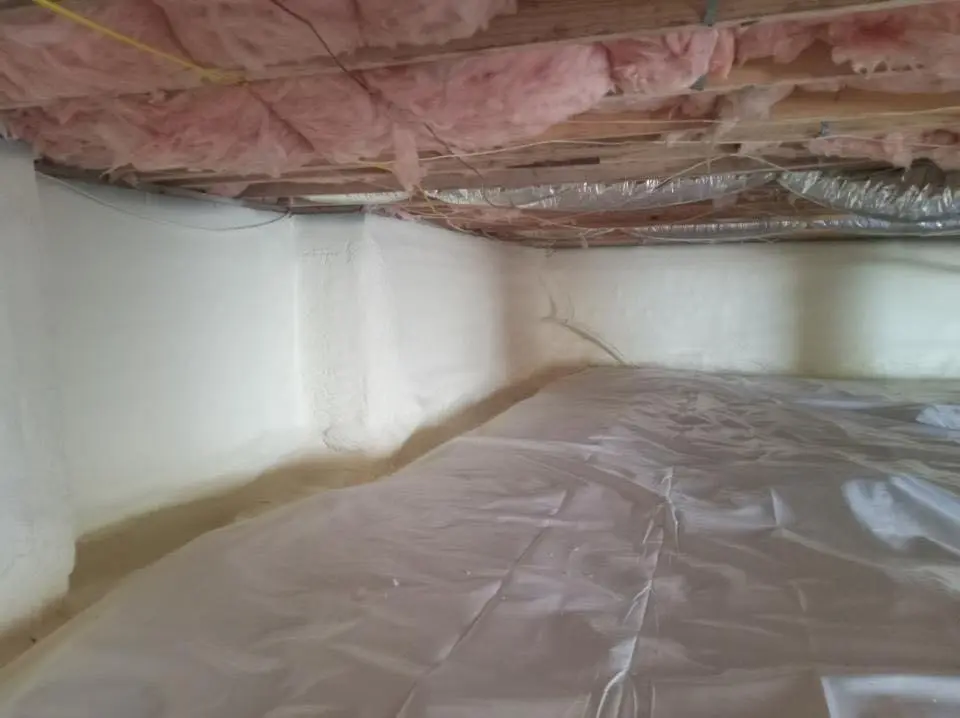 Crawl space encapsulation with closed-cell spray foam for Commercial Roof Restoration in Red Bank